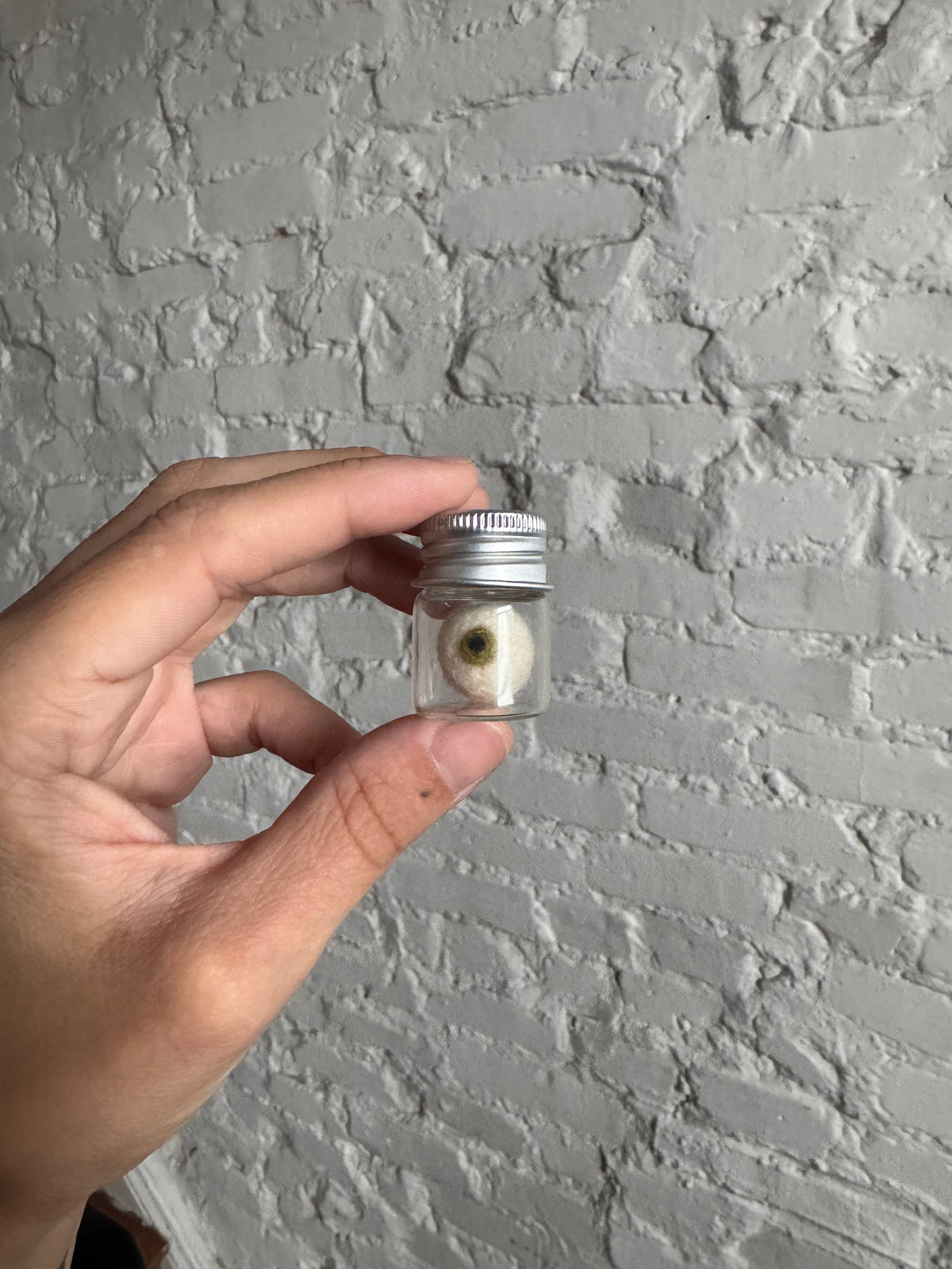 Mini needle felted eyeball in jar