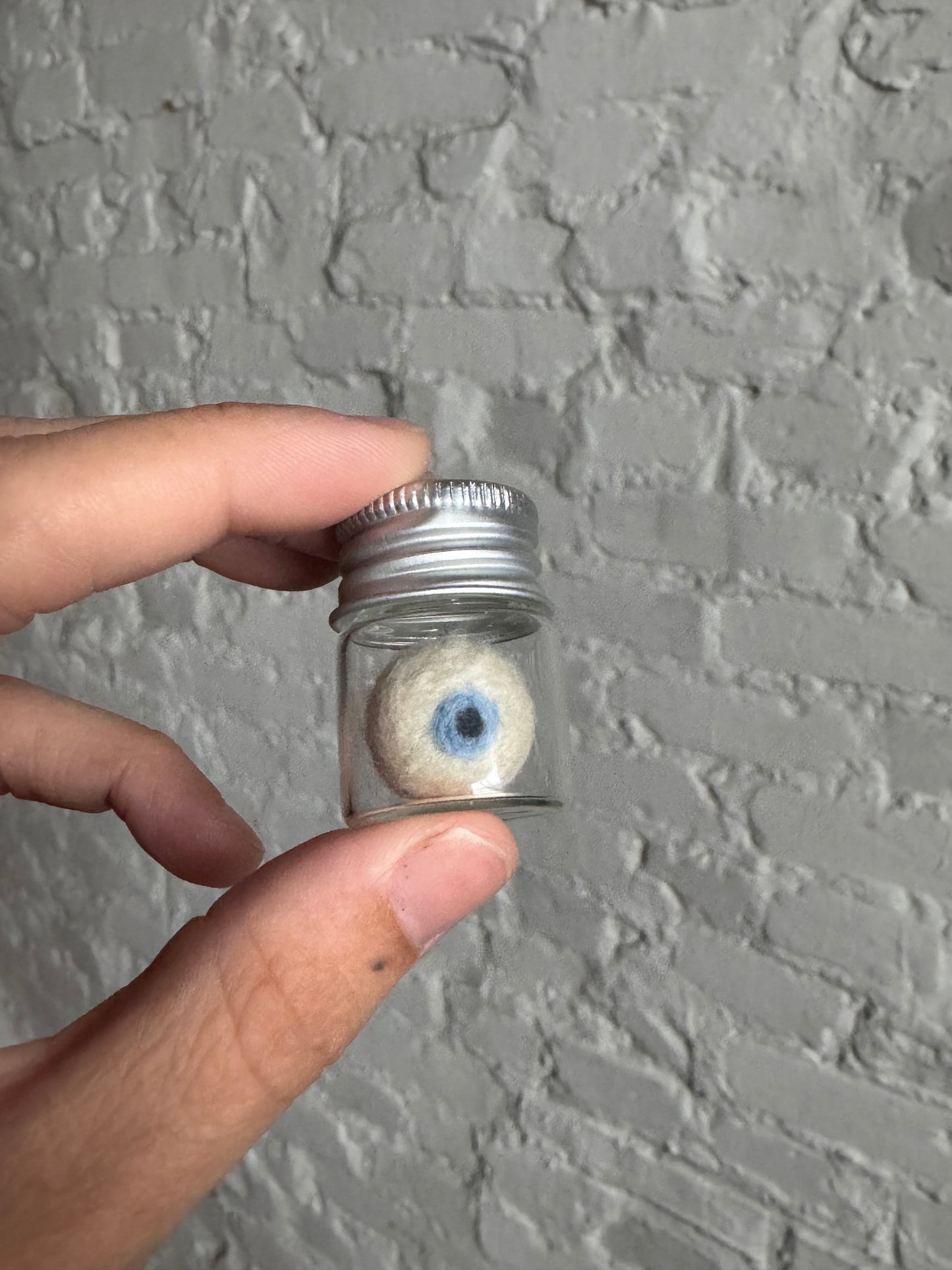 Mini needle felted eyeball in jar