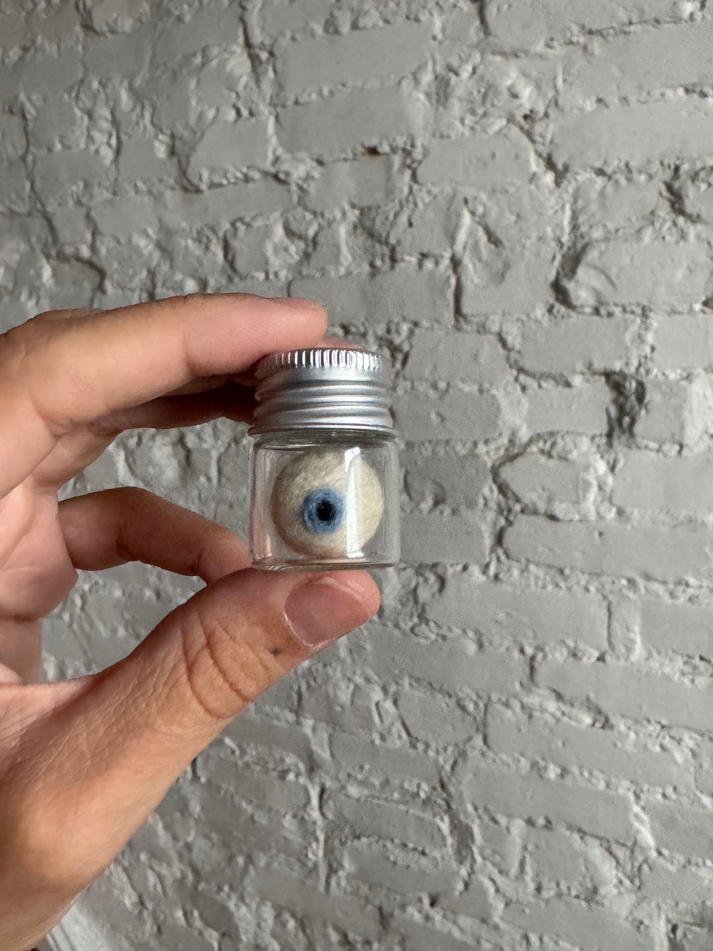 Mini needle felted eyeball in jar