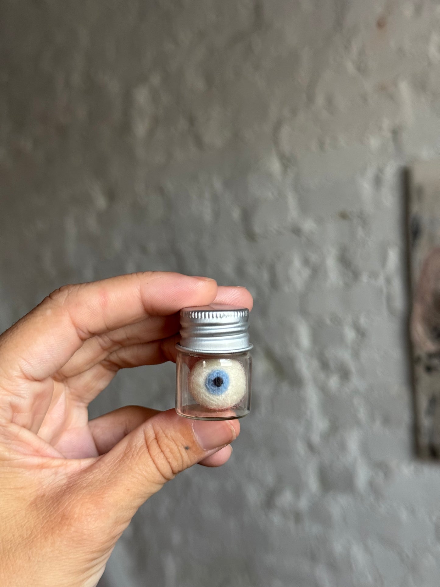 Mini felted eyeball in jar