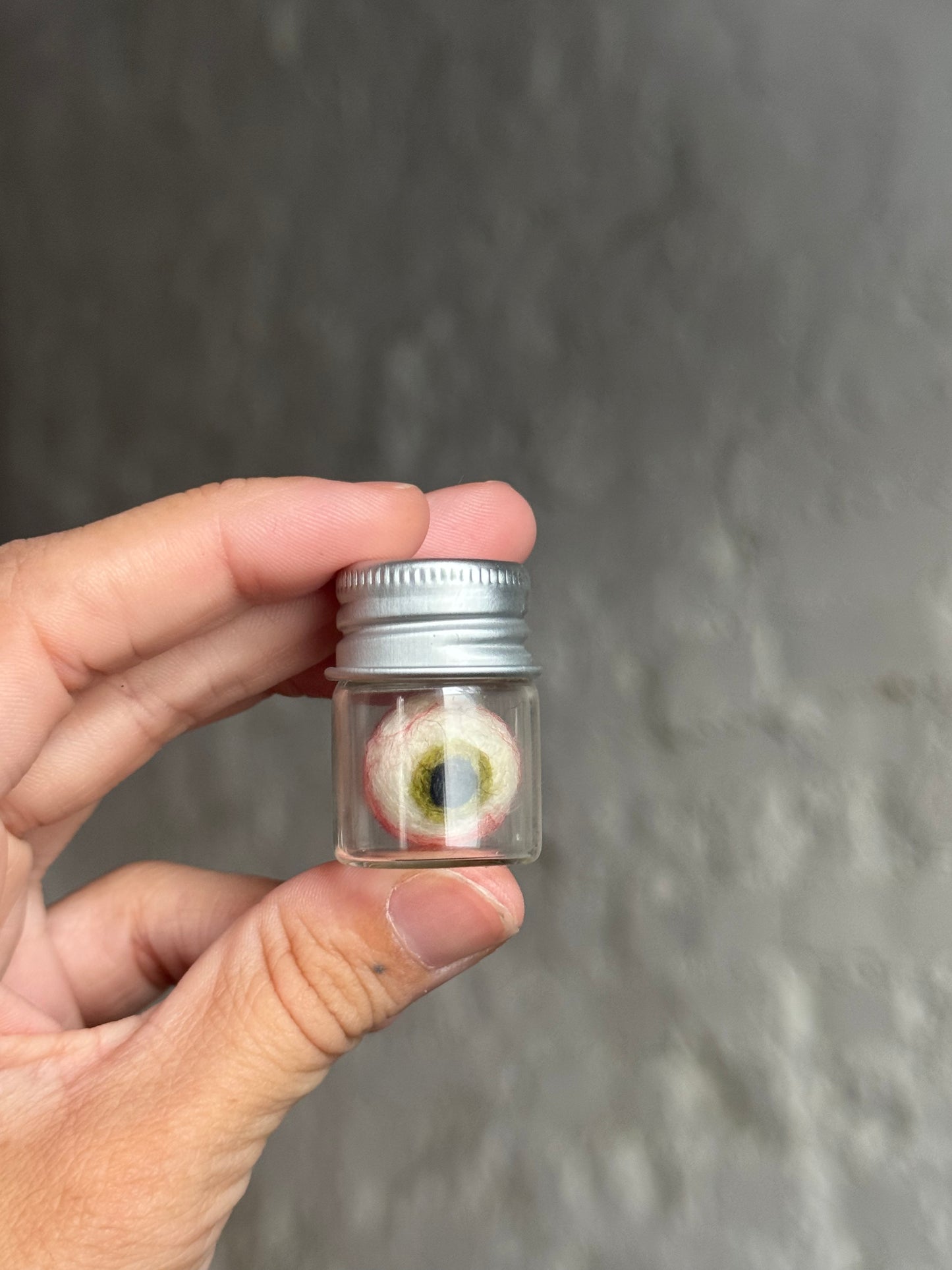 Mini felted eyeball in jar